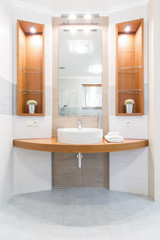 Fototapeta na wymiar Bathroom with wooden details idea