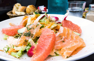 Delicious fresh salad with tomatoes, lettuce