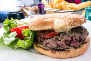 Cheese burger - American cheese burger with Golden French fries