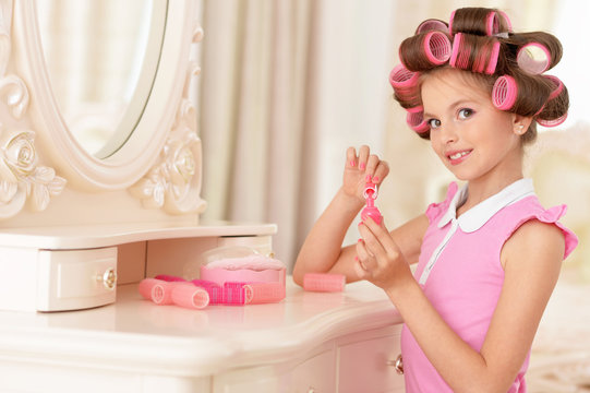 Little pretty girl   in hair curlers 