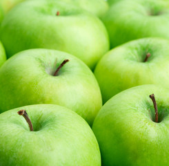 close up of green apples background