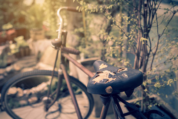 Fototapeta na wymiar Tear bike seat of vintage bicycle.