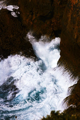 Ocean waves that break rock