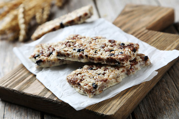 Granola bar on a grey wooden table