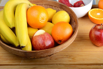 fresh fruits on wooden table. Healthy eating concept