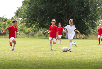 Boys on the football training on the court © Dusan Kostic