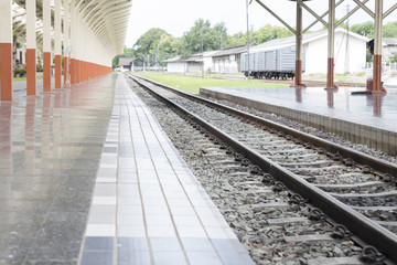 Fototapeta premium platform beside railroad at train station