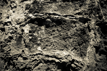 Wall made of natural stones. Background. Toned