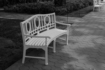 Chair in the garden,black and white background