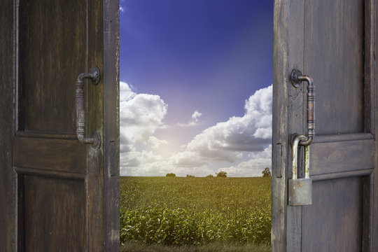 old wood window open to corn farm and blue sky cloudy - can use to display or montage on product