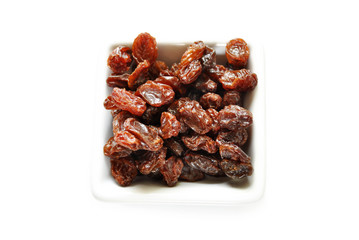 Raisins in a Square White Bowl