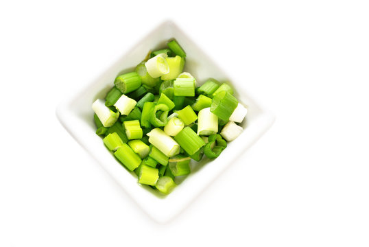 Flavorful Green Onion Sliced in a White Bowl