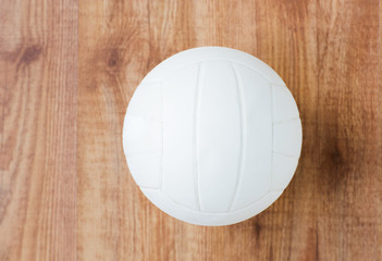 close up of volleyball ball on wooden floor