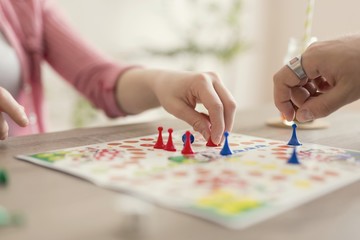 Detail of playing  the ludo board game
