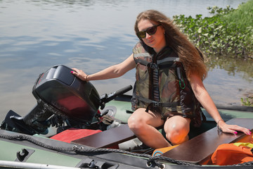 Fototapeta na wymiar Girl in a boat