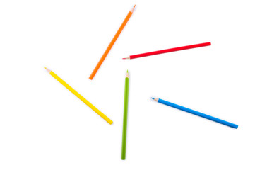 Colored pencils isolated on a white background closeup