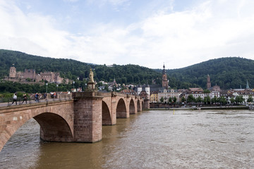 Fototapeta premium The Karl Theodor Bridge at Heidelberg, Germany with background of town and Heidelberg Castle.