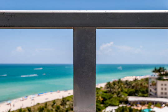 Image from balcony with tropical beach background. Abstract image of beach and sand from condo terrace view. Ocean and beach view from high-rise building. 
