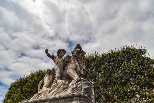 Statue of lion and cherub from Montpellier promenade du Peyrou