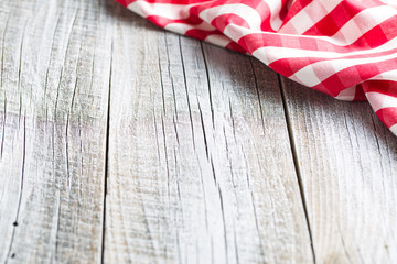 Obraz premium checkered napkin on old table