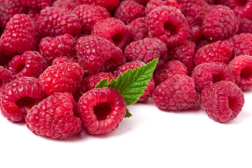 many raspberries isolated on a white background