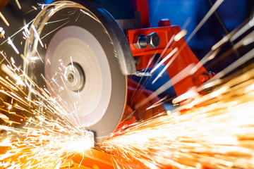 Elactric Grinder Cutting Metal with Bright Sparks