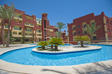 Swimming pool in luxury tropical hotel resort