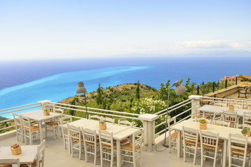 Luxury terrace balcony of exclusive seaside resort with fancy ta