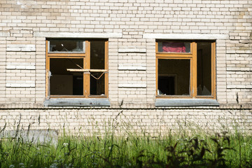 broken windows with smashed glass