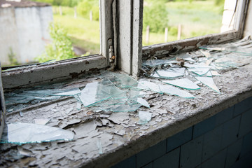 broken windows with smashed glass