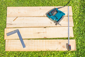 Wooden planks and fret saw