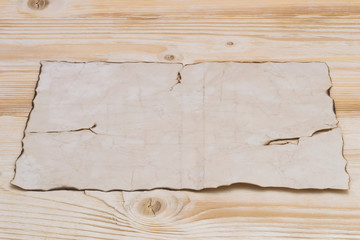 one old leaf on a light table