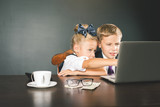 Business or school kids uses a laptop computer