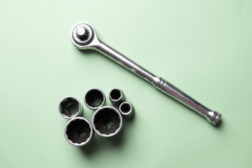The image of tools on a green background