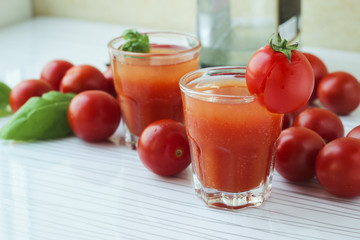 Cocktail Bloody Mary in cold glasses on a white background