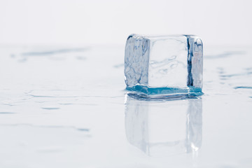 Ice cube on table
