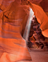 Beam of light shinning in slot canyon