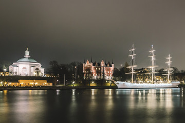 Red Castle and a Boat at Night in Stockholm, Sweden