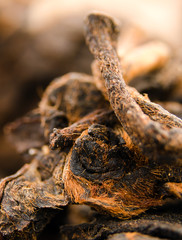 Pu-Erh Or Pu'er (Poo-Ar, Pinyin) Is A Variety Of Fermented And Aged Dark Tea. Yunnan Province, China. Macro. Under A Microscope.