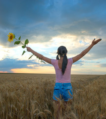 Woman feeling free in a beautiful natural setting.