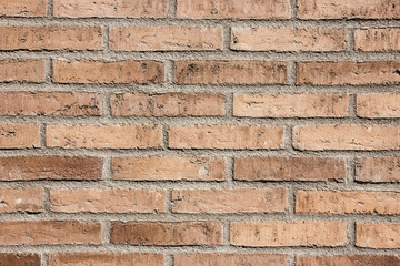 Red brick wall grunge background.