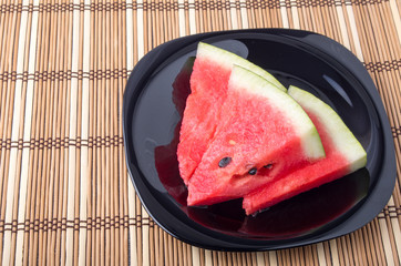 View from above on the pieces of juicy red watermelon