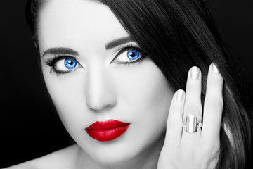 Portrait of beautiful woman with ring. Perfect makeup.