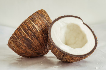 Two fresh halves of coconut