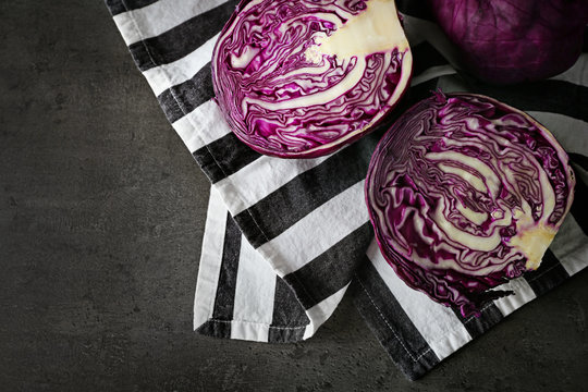 Fresh red cabbage on napkin, top view