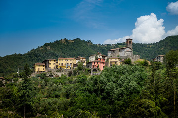 Fototapeta na wymiar Ceserana and the medieval fortress, Garfagnana, Tuscany, Italy