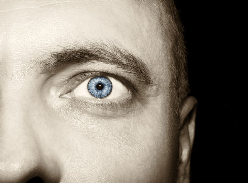 Image of man's vintage  eye close up.