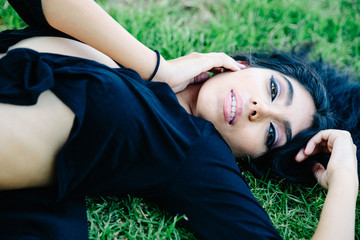 Teenager lying on the field