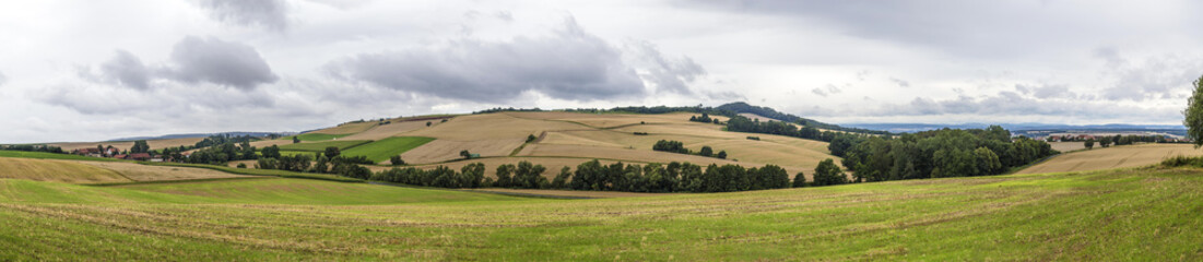 Obraz premium Rural landscape with fields and clouds near Felsberg