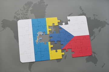 puzzle with the national flag of canary islands and czech republic on a world map background.